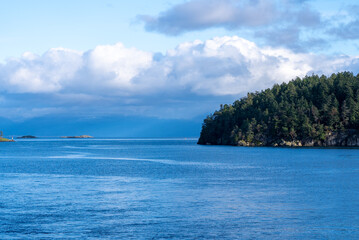 Fototapeta premium Coastal scenery on a sunny day with clouds