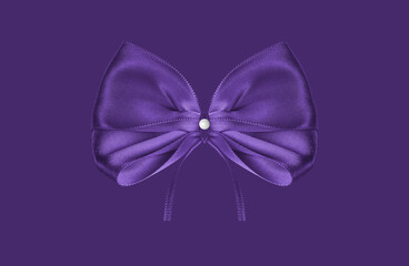 A large lilac bow on a bright background