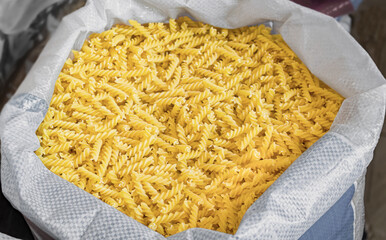 Bulk pasta at a grocery supermarket, dry bulk pasta at a grocery store