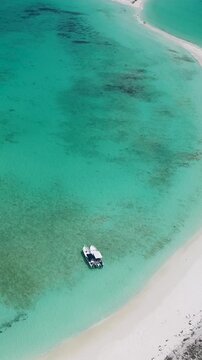Los Roques Skyline In Los Roques Caracas Venezuela. Turquoise Ocean Waves Gently Crashing On Tropical Beach. Coast Clouds Sky Seaside Summertime. Coast Panorama. Los Roques Caracas.
