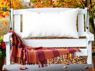 White porch swing with autumn blanket