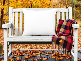 White porch swing with plaid blanket in autumn