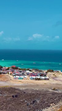 Los Roques Lighthouse In Los Roques Caracas Venezuela. Aerial View Of A Landmark Tall Lighthouse In A Coast Beach. Coast Clouds Sky Seaside Summertime. Coast Panorama. Los Roques Caracas.