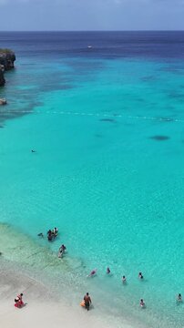 Kenepa Grandi Beach In Willemstad Netherlands Curacao. Aerial View Of Stunning Beach With Crystal Clear Waters. Paradise Skyline Recreation Wanderlust. Paradise Water Edge Shore.
