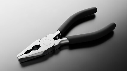 Close up of pliers tool on dark surface with light