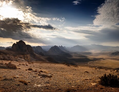sweeping rugged terrain under a dramatic sky high limestone peaks dominate the distant horizon showing arid climate and remote plateaus mountain range high country elevated