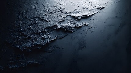 Dark textured abstract background with rugged surface