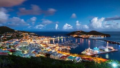 view at night of the harbor and the bay of marigot in the caribbean island of saint martin st maarten french west indies saba island in the background