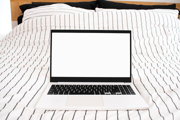 침대 위 비즈니스 노트북 목업