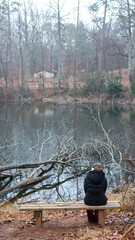 Obraz premium girl alone listening to music in the woods