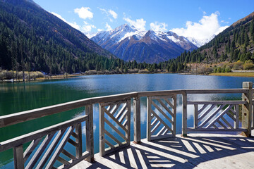 Dagu lake at Dagu Glacier National Park, Sichuan China the "youngest," lowest-altitude, and closest glacier to major city in the world with stunning views of snow-capped mountains and turquoise lake