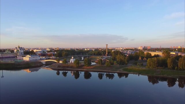 Drone flies over the Volga River in Tver. Aerial views show the city, bridges across the river, a church, a cathedral, and other landmarks from above.