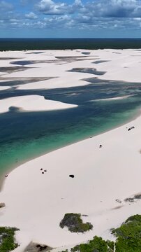 Lencois Maranhenses Skyline In Santo Amaro Maranhao Brazil. Turquoise Lagoons And Sand Dunes Creating Inspiring Landscape. Coast Sky Clouds Seaside Summertime.