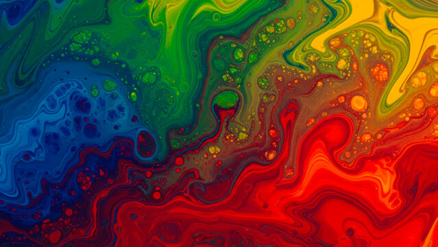 Vibrant abstract fluid art with swirling colors and cellular patterns