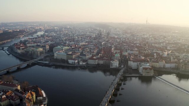 Aerial Drone View of Charles Bridge and Prague Old Town at Sunrise, 4K
