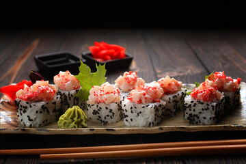 Sushi Rolls On Wooden Background © pobaralia