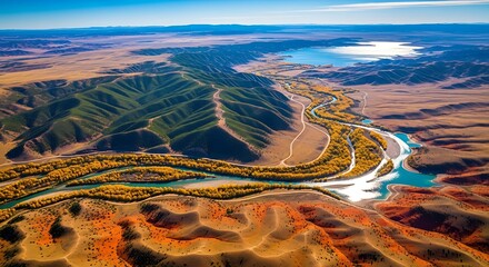 Vast Mongolian Landscape Yellow River Bends Through Arid Terrain with Verdant Banks and Distant Lake