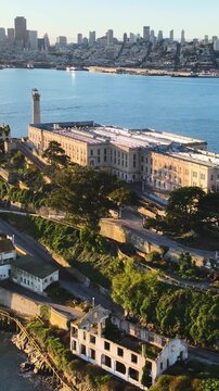 Sunset Alcatraz Island In San Francisco California United States. Aerial View Of A High-Rise Buildings And Traffic Showcasing Urban Life. Building Illumination Urban. Town Outside Famous.