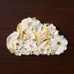 Digital legacy concept Cloud icon made of pressed flowers on dark wood symbolic memory preservation