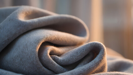 Financial calm texture Soft grey cashmere knit close-up warm light tactile comfort security abstract