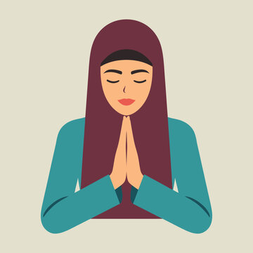 A serene Muslim woman in a hijab praying with clasped hands and closed eyes.