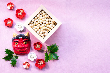 ピンク背景の節分デザイン