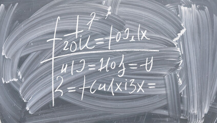 Handwritten Mathematical Equations on Chalkboard