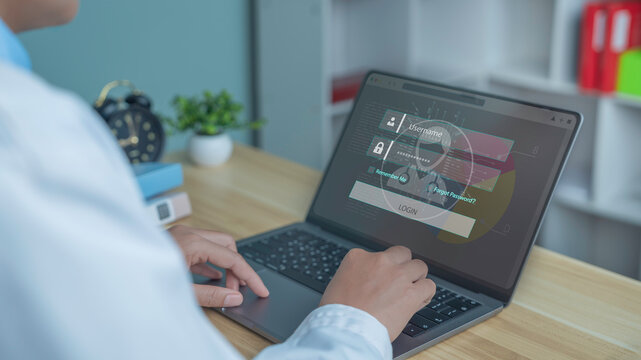 Doctor using a laptop for secure login to electronic medical records (EHR) system. Concept of modern healthcare technology, telemedicine, and data security in a hospital 