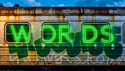 Vintage Train Car with Neon "Words" Graffiti Art © Lila Patel