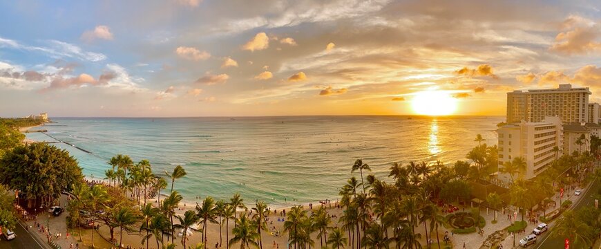 Panoramic sunset over world famous Waikiki Beach in Honolulu on the island of Oahu in Hawaii. 