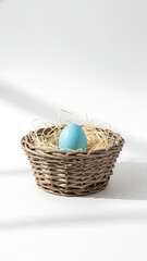 Minimalist Rustic Easter Basket with Single Blue Egg, Elegant Spring Holiday Decoration, Clean White Background