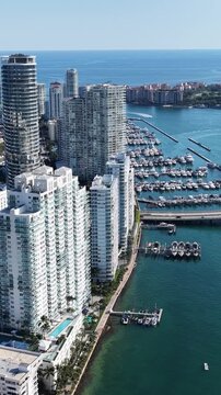 Miami Beach Skyline In Miami Beach Florida United States. Aerial View Of Stunning Beach With Crystal Clear Waters. Business Sky Clouds Downtown Cityscape. Drone View Downtown Panoramic.