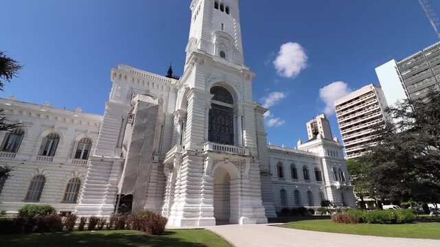 Facade of the City Hall in La Plata City Buenos Aires Argentina. Historic building facing Moreno Square on a sunny summer day