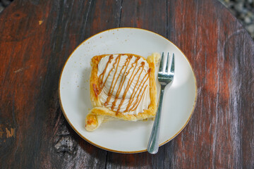 Sweet assorted pastries with colorful cream puffs, soft airy texture, creamy rich filling, and delightful dessert flavor, modern caf&eacute; style presentation with inviting visuals and appetizing charm