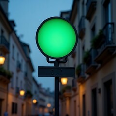 A green traffic light stands tall on a city street at dusk, surrounded by buildings and warm streetlights