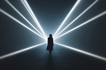 Fototapeta premium A lone human figure standing within beams of light, symbolizing direction, choice, and transformation toward the future.