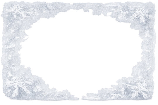 Frozen ice frame transforming a background with real snowflakes creating a winter border for holidays and cold designs