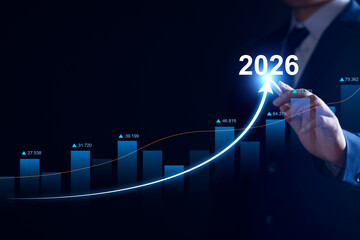 Business goals beginning 2026 new year concept, Businessman touching increase arrow investment graph future growth 2026. Financial planning target and strategy, Budgeting Plan and business challenge.