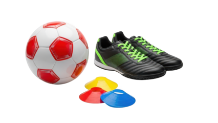 A pair of black soccer cleats with green laces and a soccer ball with red and white panels on transparent background