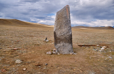 Sacrificial deer stone monuments in ancient burial sites in the Yustyd River valley. Altai Republic.