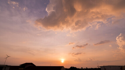 Panoramic view of sunset golden and blue sky nature background.
Colorful dramatic sky with cloud at sunset.Sky background.Sky with clouds at sunset.