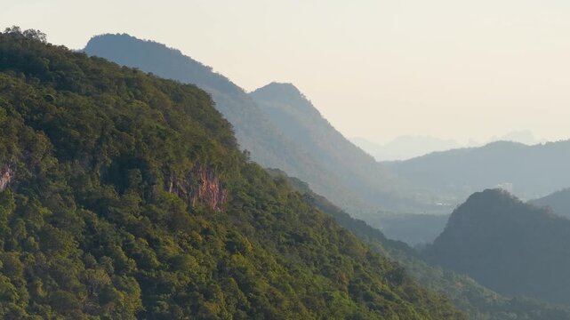 Aerial Drone Pan Over Lush Tropical Forested Mountains in Khao Yai Thailand
