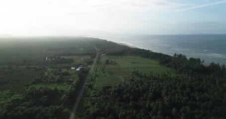 The road between the Rambungan Ferry and Sempadi is peaceful, scenic coastal secondary forests ,Mount Serapi,palm oil estates,Sempadi Beaches and Prawn Farm.