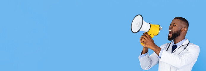 A doctor passionately speaks into a megaphone, conveying an important message. He is dressed in a white coat and a tie, set against a bright blue background.