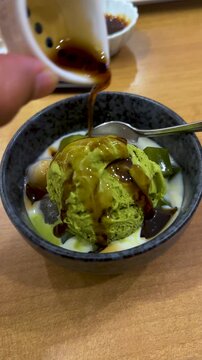Brown Sugar Syrup Poured Over Matcha Ice Cream Dessert