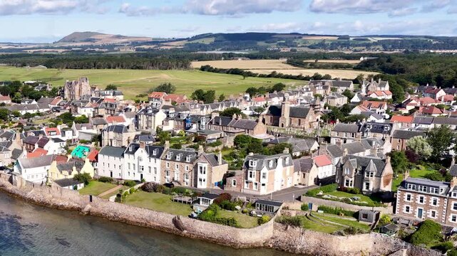 Aerial Flyover of Coastal Village Houses in Dundee, Scotland