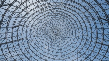 Looking Up At Metal And Glass Geodesic Dome Structure