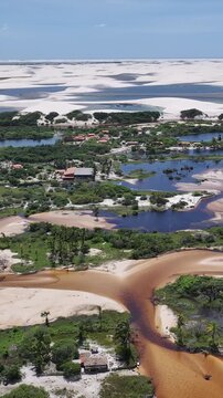 Betania Village In Santo Amaro Maranhao Brazil. Tropical River With A Scenic Forest Trees Viewed From Above. Shore Clouds Beach Sea. International Beach Travel. Santo Amaro Maranhao.