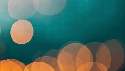 Abstract background with bokeh lights and teal colors