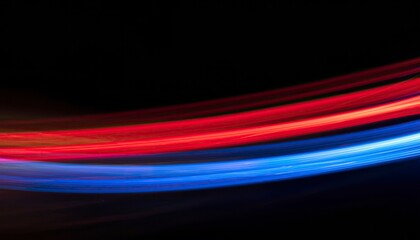 Abstract red and blue light streaks on a black background
